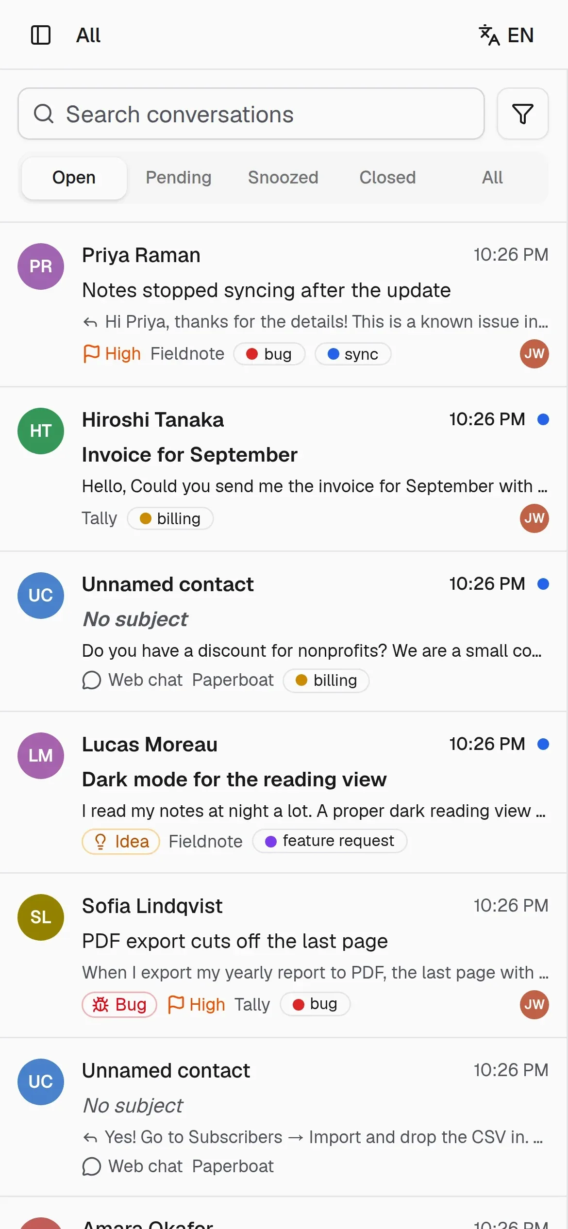 The panel on a phone: the conversation list with labels, priorities and assignees.